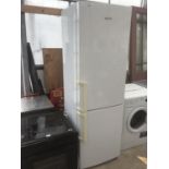 A SAMSUNG FRIDGE FREEZER IN WORKING ORDER