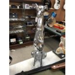 A LARGE CHROME SEATED GREYHOUND MODEL