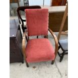 AN OAK FRAMED NURSING CHAIR