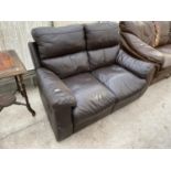 A BLACK LEATHER TWO SEATER SOFA