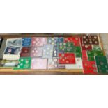 A SELECTION OF 28 WORLDWIDE COIN PACKS TO INCLUDE : CANADA , BERMUDA , AUSTRALIA , MACAO , ICELAND ,
