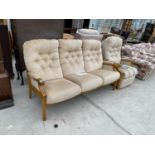 A CINTIQUE THREE SEATER SOFA AND MATCHING ELECTRIC RECLINING ARMCHAIR