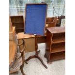 A PINE THREE LEGGED STAND WITH FRAMED NOTICE BOARD TOP