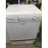 A HOTPOINT AQUARIUS DRYER IN WORKING ORDER