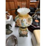 A VINTAGE GLASS HAND PAINTED OIL LAMP