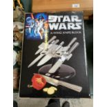 A NEW AND BOXED STAR WARS X-WING KNIFE BLOCK SET