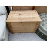 A PINE BEDDING CHEST