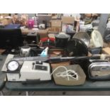 A LARGE COLLECTION OF ELECTRICALS TO INCLUDE FANS, LAMPS, TOASTER, MAGIC BROOM ETC IN WORKING ORDER