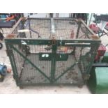 A LARGE METAL STORAGE CAGE