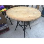 A PINE ROUND TOP PUB TABLE