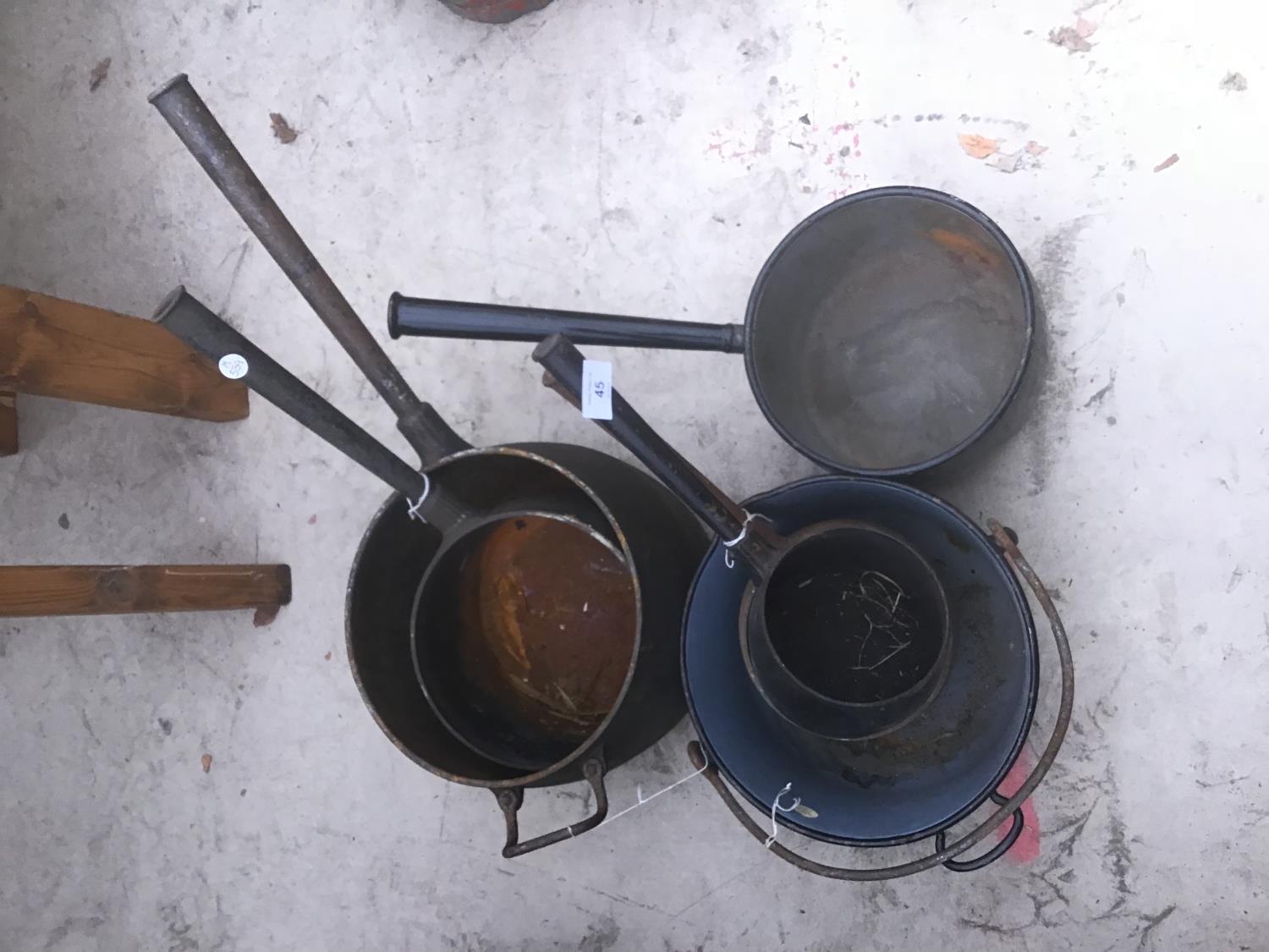 FIVE VARIOUS VINTAGE CAST IRON PANS TO INCLUDE A JAM PAN