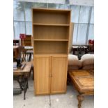 A MODERN OAK BOOKCASE CABINET WITH TWO LOWER DOORS