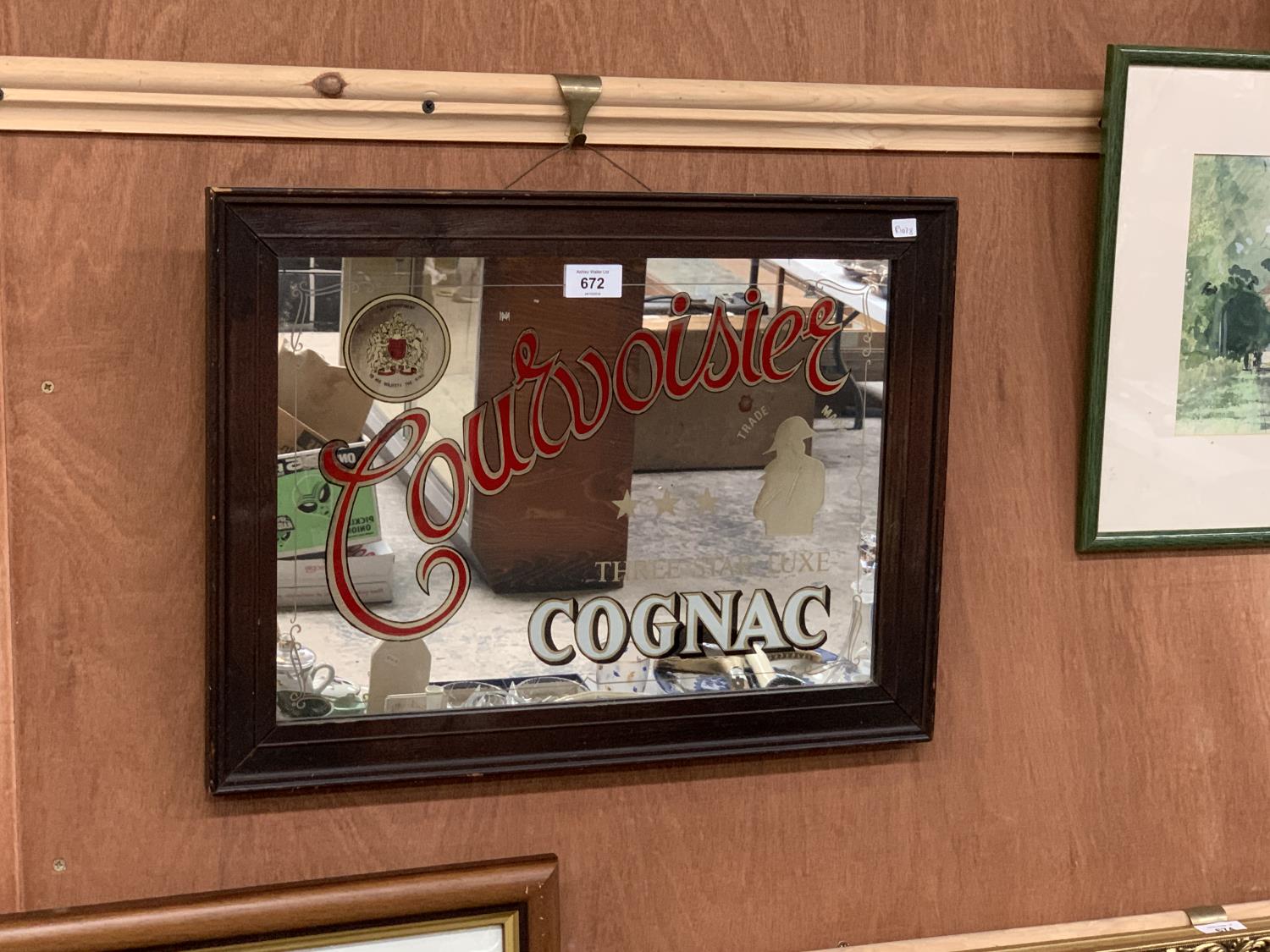 A WOODEN FRAMED PUB ADVERTISING MIRROR