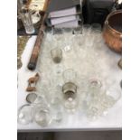 A LARGE COLLECTION OF GLASSES