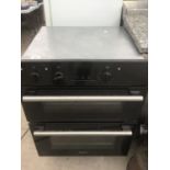 AN INTEGRATED HOTPOINT DOUBLE OVEN, GRILL