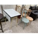 A DROP LEAF FORMICA TABLE, FOUR BENTWOOD DINING CHAIRS AND A TILE TOP SIDE TABLE