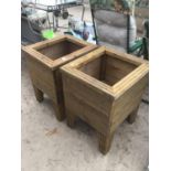 A PAIR OF WOODEN PLANTERS 47CM X 50CM APPROX