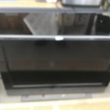 A HUMAX 32 INCH TELEVISION (NO LEADS)