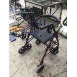 TWO MOBILITY ITEMS TO INCLUDE A WALKER SEAT WITH BRAKES AND A THREE WHEELED WALKER