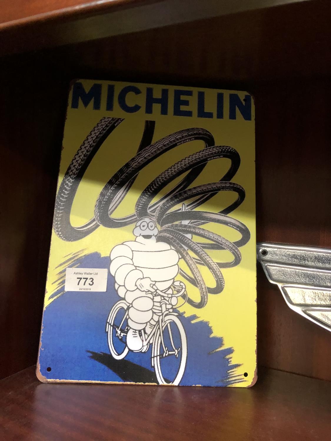 A VINTAGE STYLE 'MICHELIN MAN' METAL SIGN