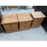 THREE PINE BEDSIDE CHESTS OF DRAWERS