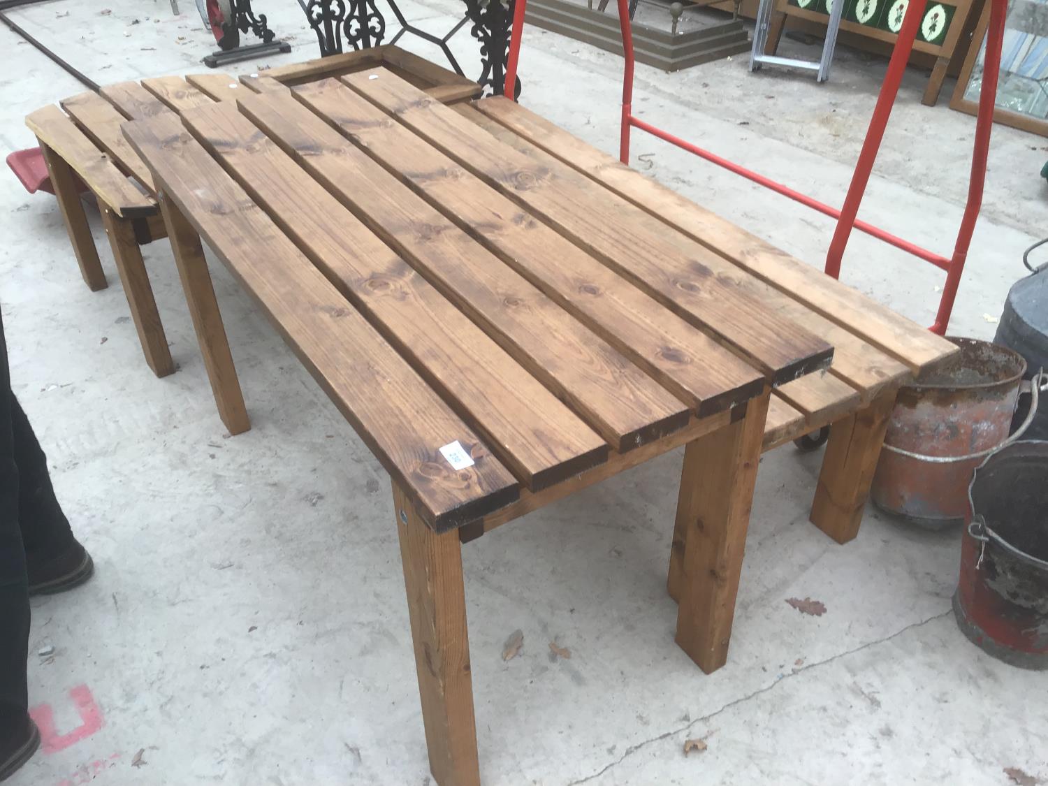 A WOODEN RECTANGULAR TABLE WITH A MATCHING TWO SEATER BENCH