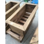 TWO LARGE WOODEN RECTANGULAR PLANTERS