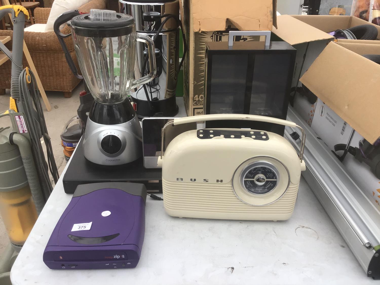 A MIXED LOT TO INCLUDE A FREEVIEW BOX, A BUSH RETRO PORTABLE RADIO, CLOCK RADIO ETC IN WORKING ORDER