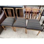 THREE TEAK DINING CHAIRS