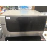 A SHARP 900W MICROWAVE IN WORKING ORDER