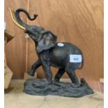 A BRONZE FRANKLIN MINT 'GIANT OF THE SERENGETI' ELEPHANT FIGURE WITH GOLD PLATED TUSKS, HEIGHT 24.