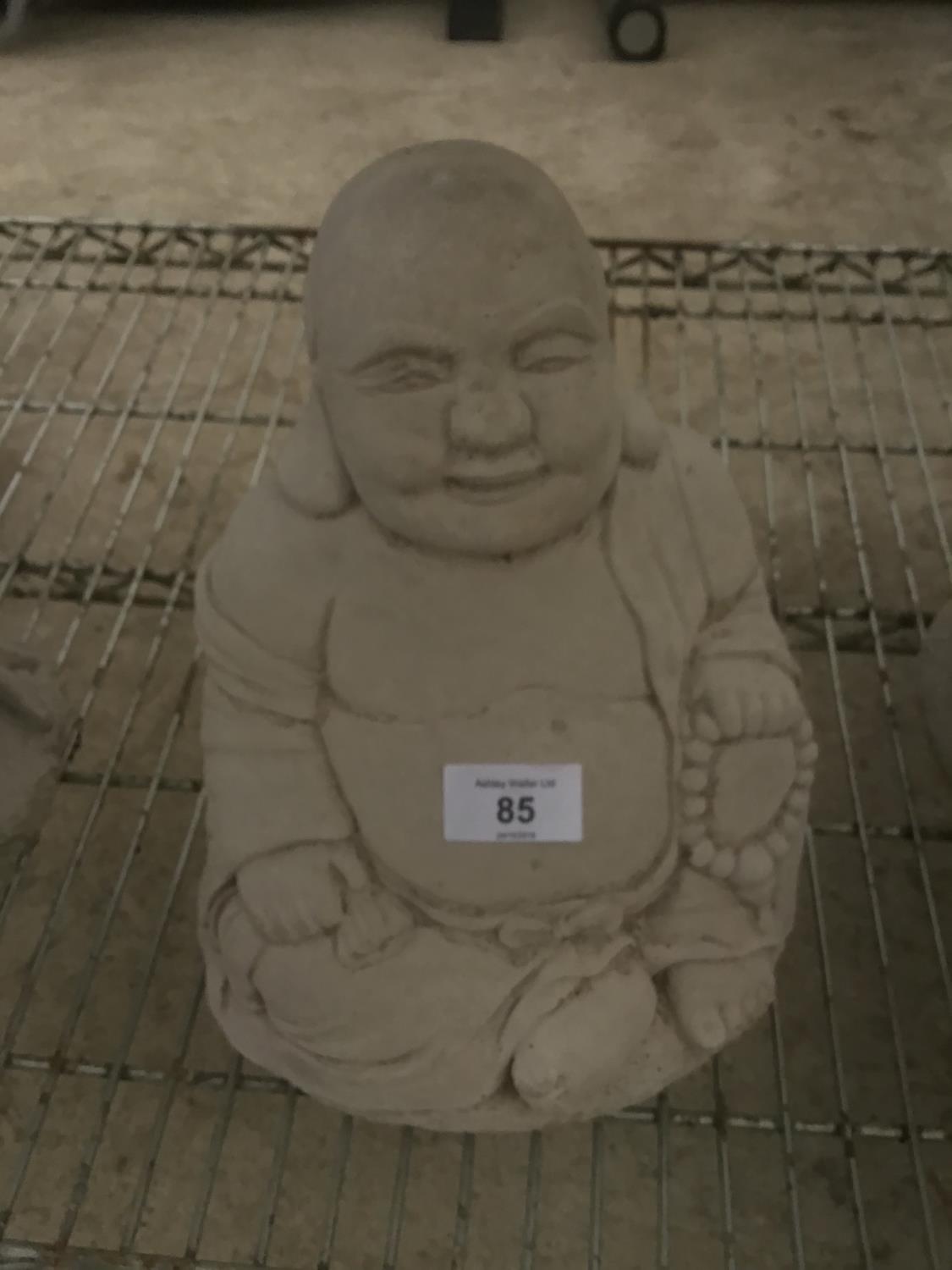 A LARGE CONCRETE BUDDHA