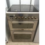 A DELONGI PROFESSIONAL DOUBLE OVEN, GRILL AND CERAMIC FOUR RING HOB (NEEDS CLEANING)