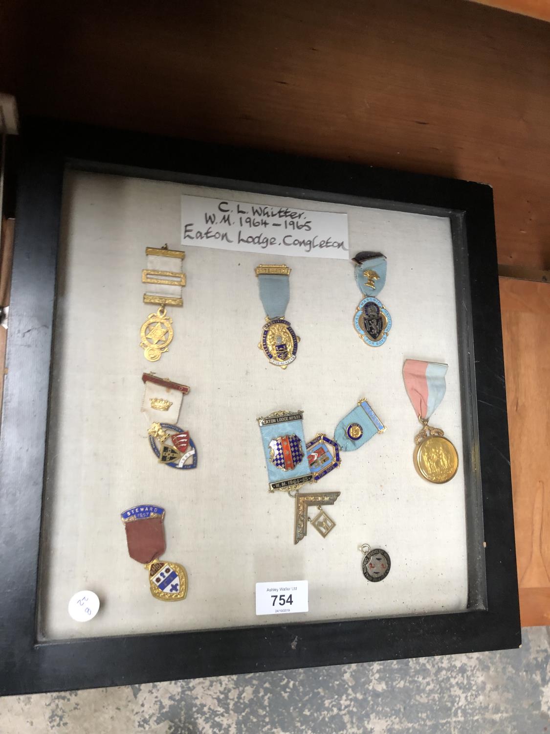 A FRAMED SET OF MASONIC LODGE MEDALS, NAMED