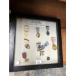 A FRAMED SET OF MASONIC LODGE MEDALS, NAMED