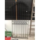 A PAIR OF WROUGHT IRON TALL GATES