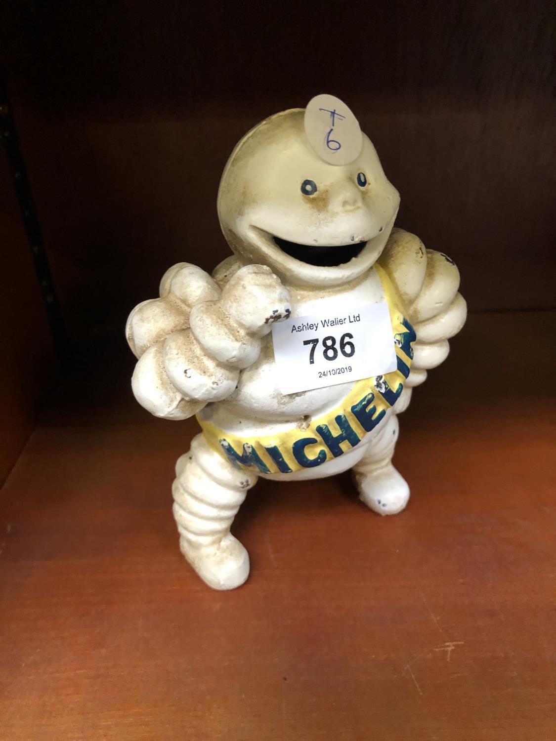 A CAST METAL MICHELIN MAN MODEL