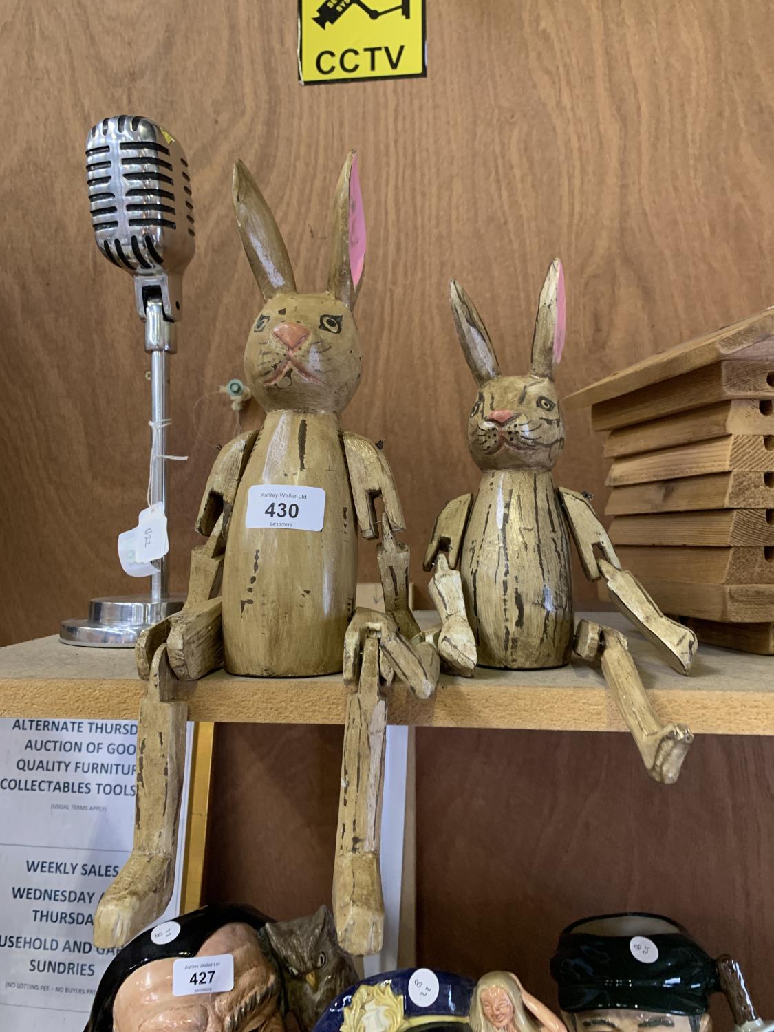 TWO WOODEN SHELF RABBIT FIGURES