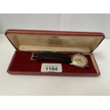 A GENTS BOXED MANUAL WIND 'GARRARD' PRESENTATION WRIST WATCH