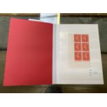 GREAT BRITAIN , A SMALL RED STOCKBOOK WITH A COLLECTION OF GV1 & QE11 , UNMOUNTED MINT CYLINDER