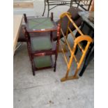 A MAHOGANY THREE TIER SERVING STAND WITH GREEN LEATHER TOP AND A PINE TOWEL RAIL