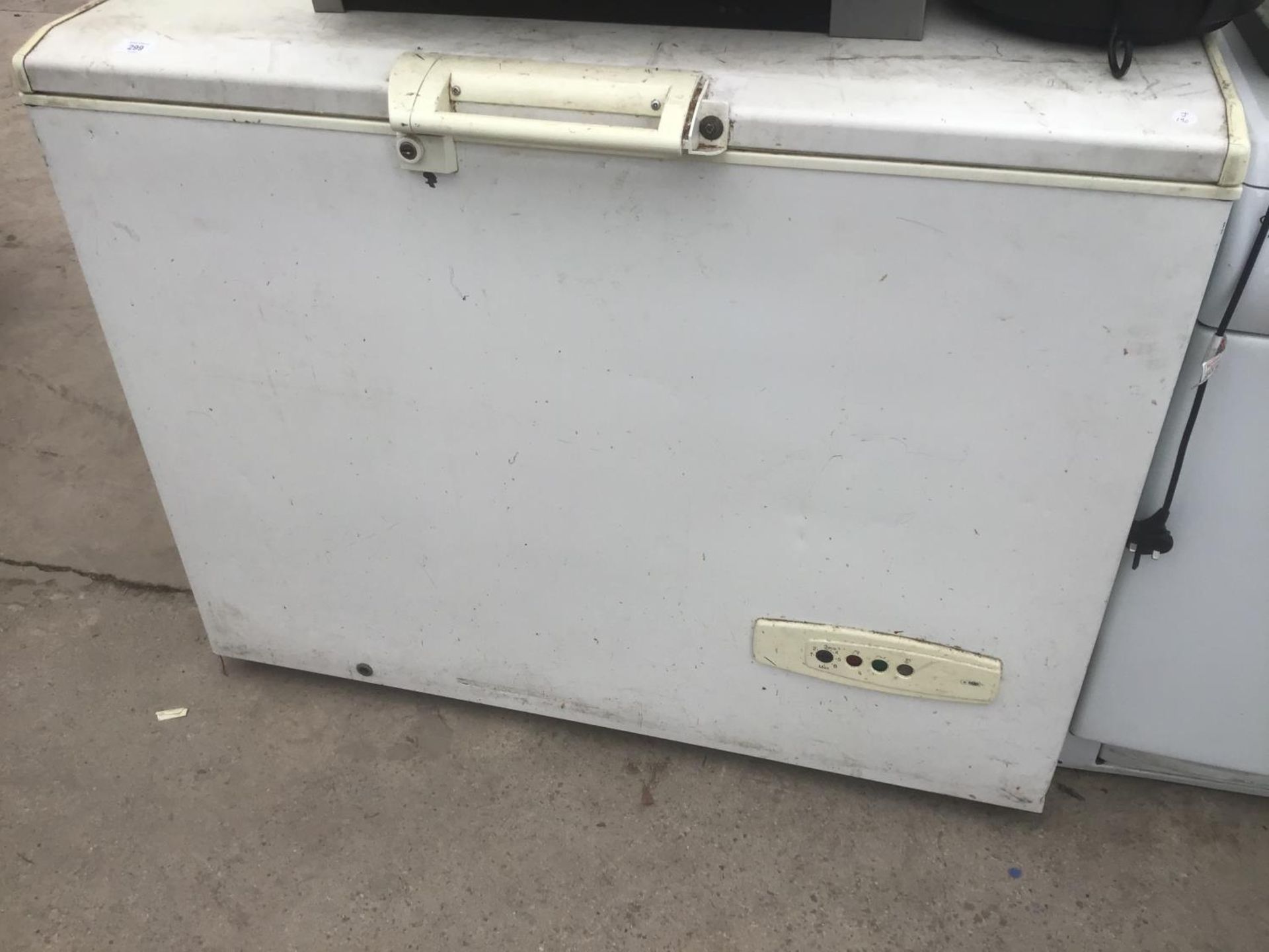 A CHEST FREEZER IN WORKING ORDER