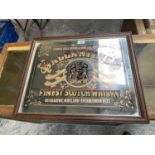 A WOODEN FRAMED BALLANTINE'S MIRROR