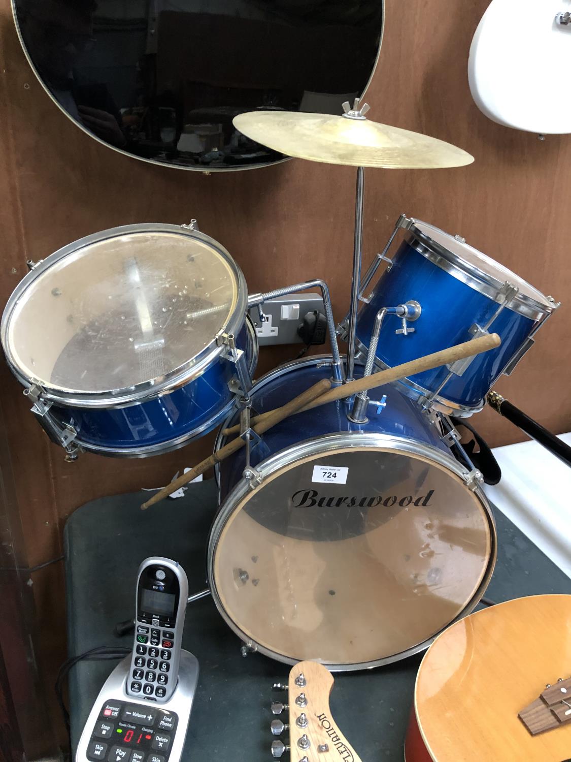 A SMALL BURSWOOD DRUM KIT TOGETHER WITH STICKS