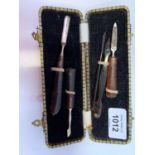 A CASED VINTAGE MANICURE SET