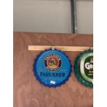 A COLLECTABLE METAL BEER BOTTLE CAP 'PAULANER' SIGN