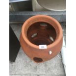 A TERRACOTTA STRAWBERRY POT