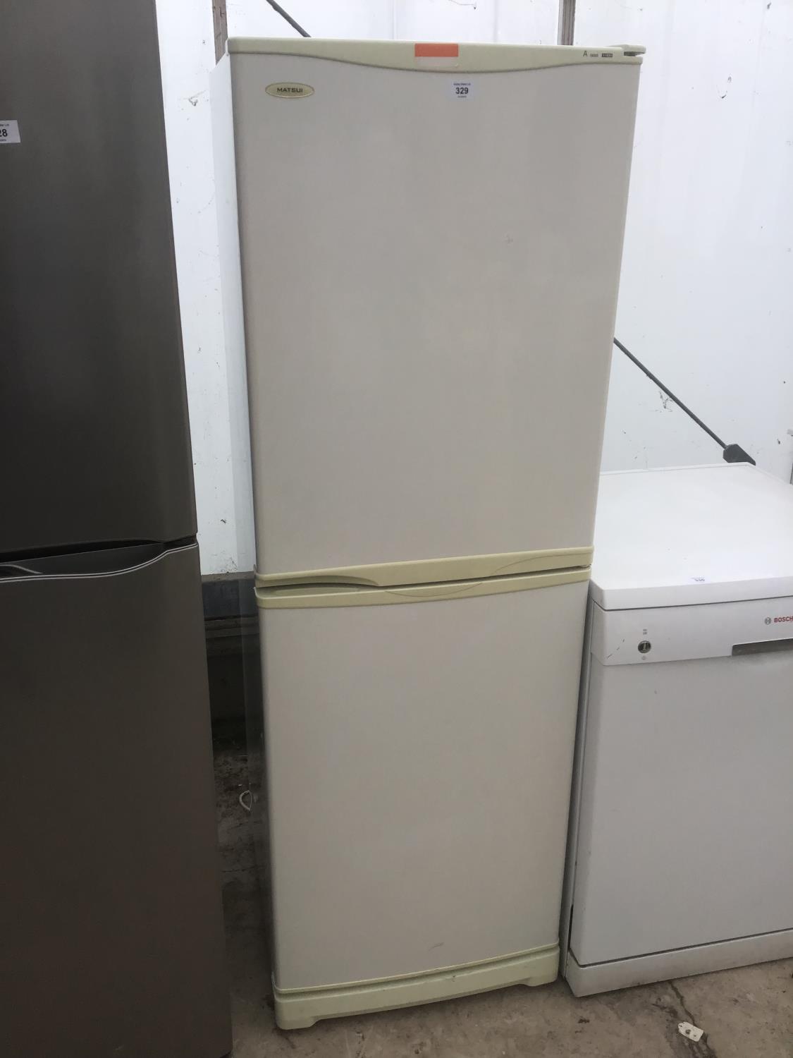 A MATSUI FRIDGE FREEZER IN WORKING ORDER