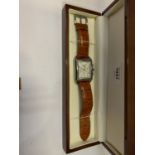 A BOXED GENTS FASHION WRIST WATCH