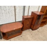 THREE YEW WOOD ITEMS - A TV STAND, SMALL CABINET AND STEREO CABINET